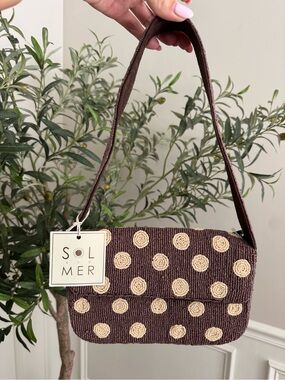 Sol and Mer brown beaded handbag with beige polka dots